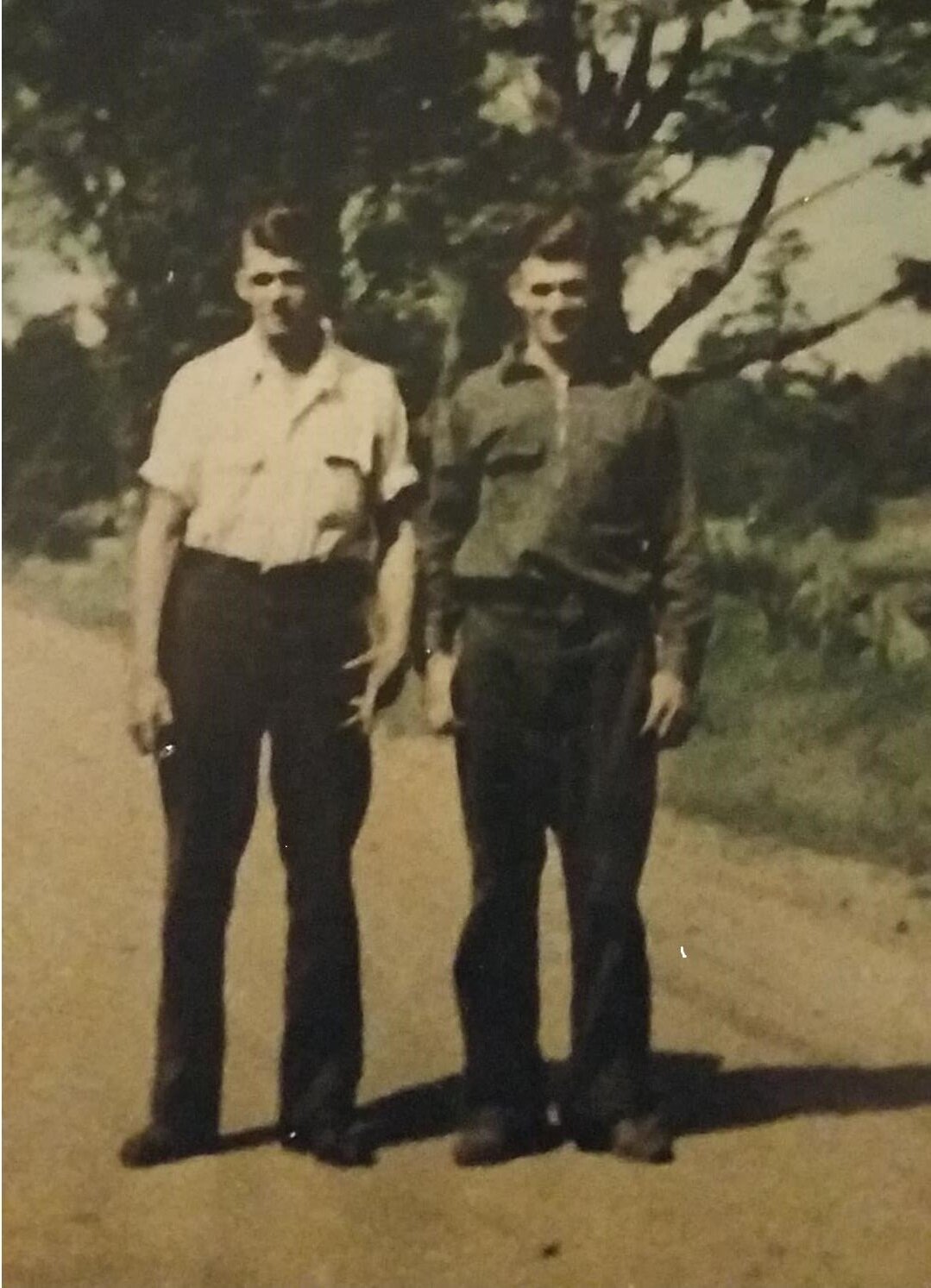 Chet Dean (right) with his brother Charlie in a somewhat blurred photo. Charlie also served in WW II and lived to enjoy a few years of retirement. Photo: Deb Covey Morley