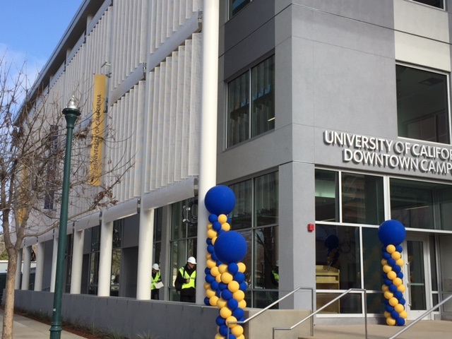 Construction workers checking details as the final touches are being made to the UC Merced Downtown Campus Center. Photo: Steve Newvine