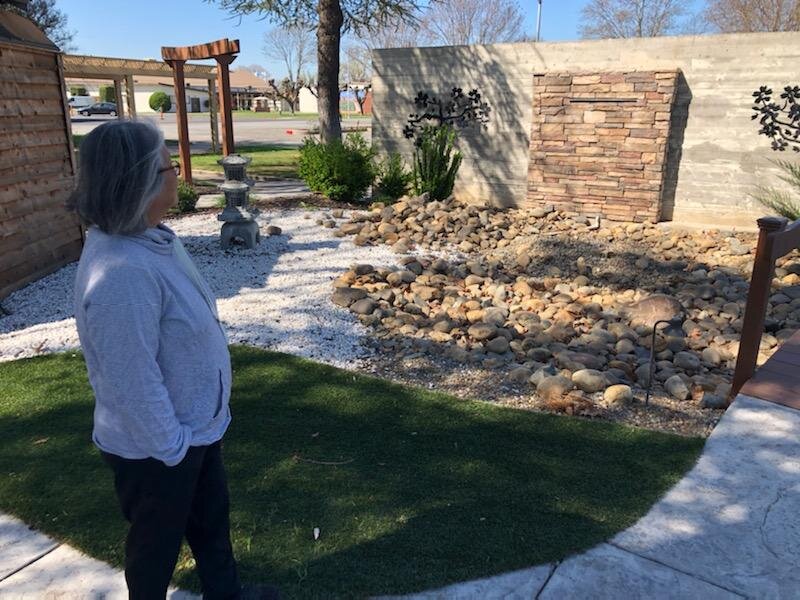 Patti Kishi views the Memorial Garden at the Merced Assembly Center Memorial. Photo- Steve Newvine