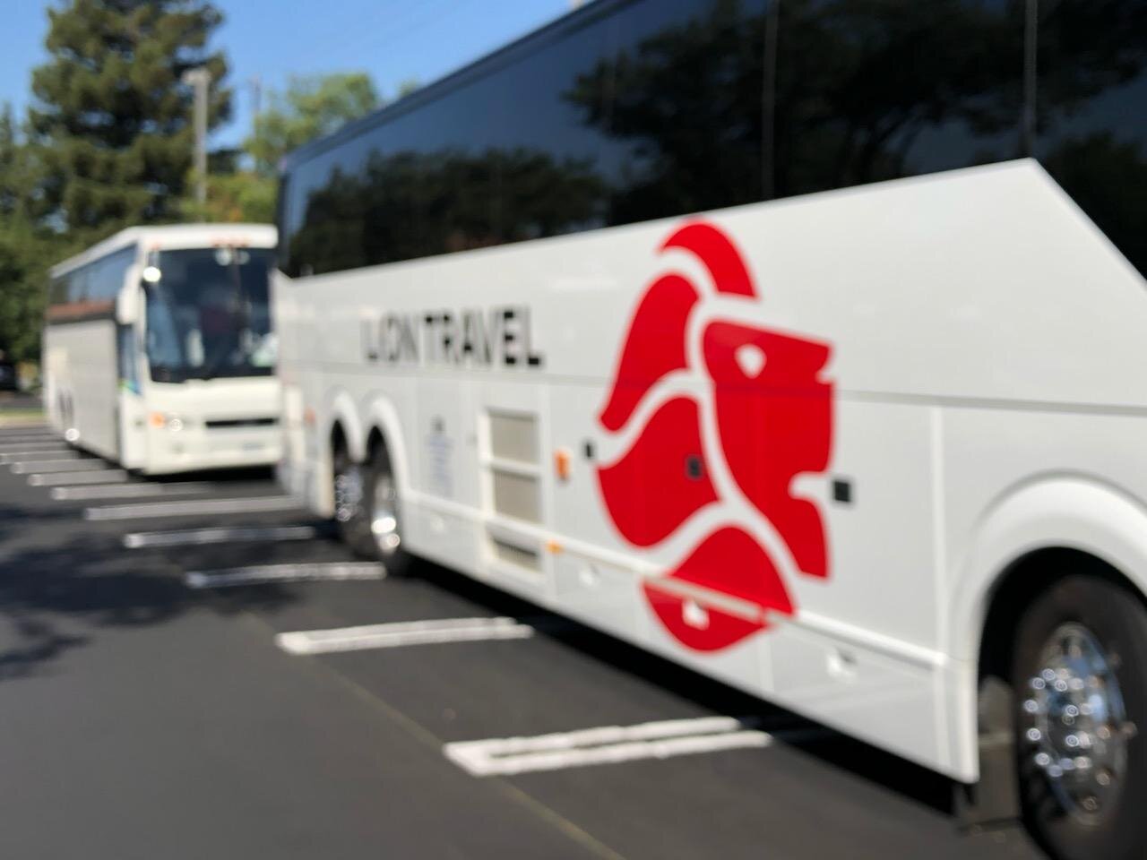 A tour bus can bring a lot of spending power to a local business. That’s why stores like Raley’s and Savemart cater to these tour groups heading to Yosemite. Photo- Steve Newvine