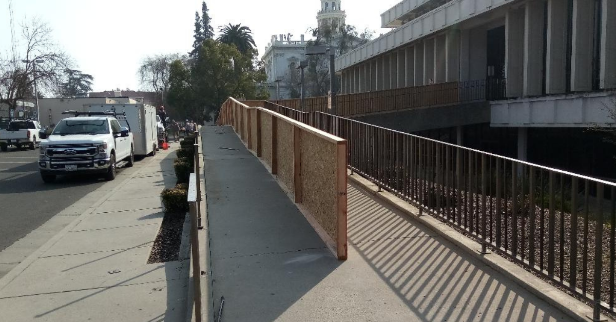 Workers recently replaced the railing in front of the Merced County Library Main Branch. Photo: Steve Nervine