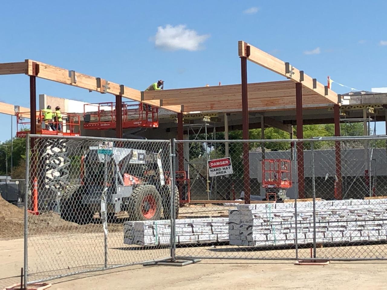While the primary shopping area is closed to shoppers, construction crews continue their work on the Merced Mall expansion. Photo: Steve Newvine