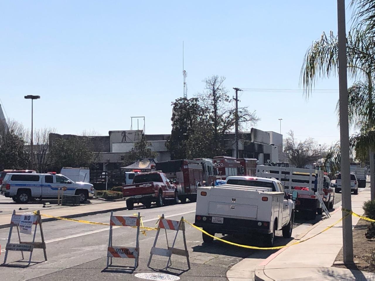 Public safety barriers encircled the block where the remains of the Porterville Public Library once stood. Photo by Steve Newvine