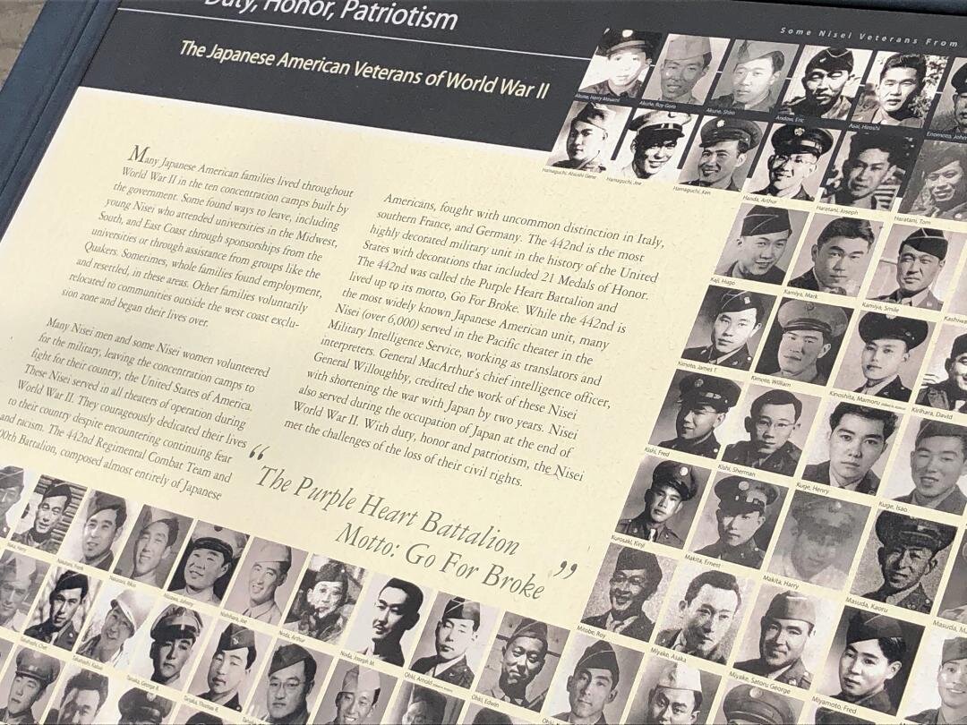 One of the information panels at the Memorial has photographs of area Japanese American soldiers who served in the US Armed Services during World War II. Photo: Steve Newvine
