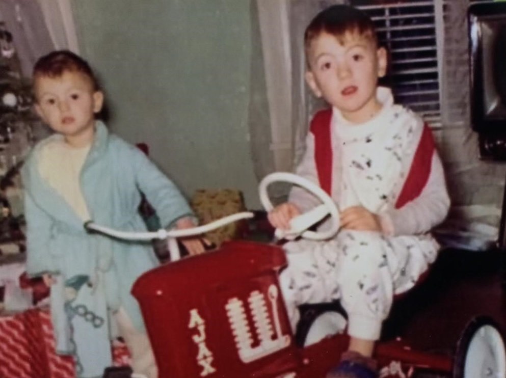 An early Christmas morning with me and my older brother Terry. Photo: Newvine Personal Collection