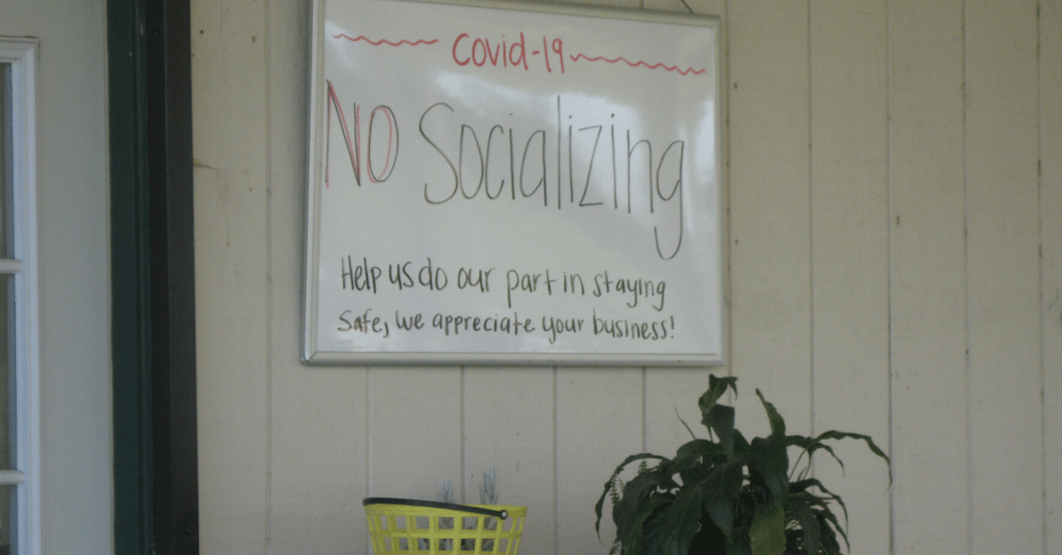 A handwritten message at an area golf course offers a blunt take on social distancing. Photo: Steve Newvine
