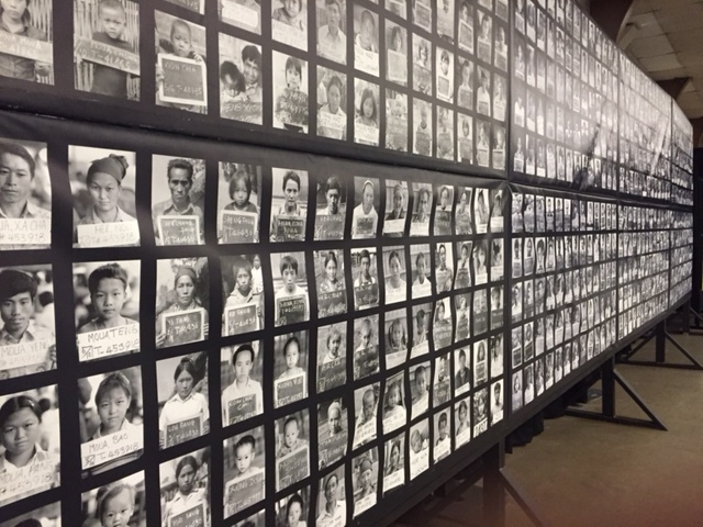 A wall full of individual Hmong community members seen near the beginning of the Hmongstory 40 exhibit at the Merced County Fairgrounds. Photo by Steve Newvine