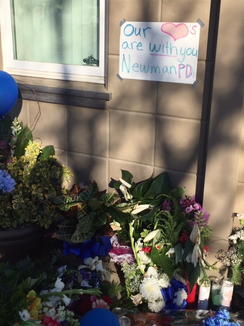 One of the posters taped to the wall honoring the Newman Police Department. Photo: Steve Newvine