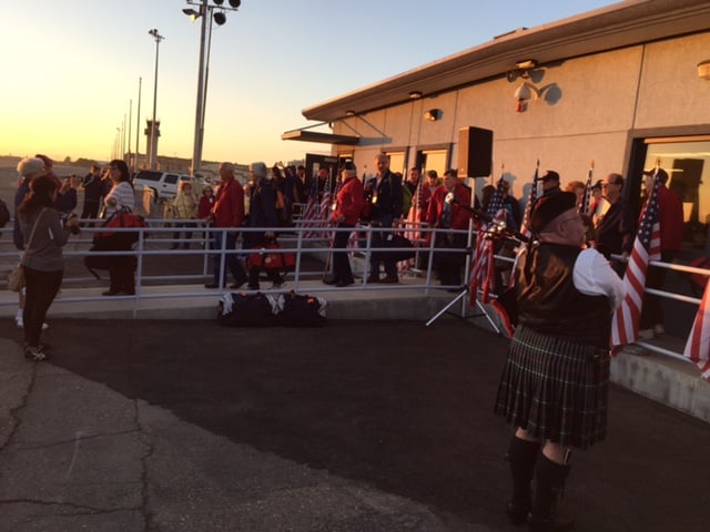 A grateful crowd wishes the Central Valley Honor Flight participants a safe trip. Photo by Vaune Newvine