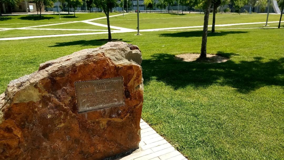 The stone marker with a brass plaque naming the Quad at UC Merced after the institution’s first Chancellor Carol Tomlinson-Keasey. Photo: Steve Newvine