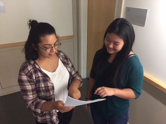 UC Merced interns Rose and Diana are learning from one another as well as learning from their students in the Summer Enrichment Program of the Harvest Park Educational Center. Photo by Steve Newvine