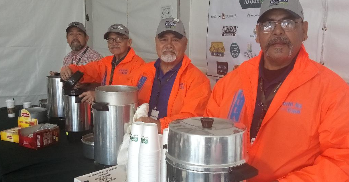 These volunteers staffed a media center at the World Ag Expo. Over twelve-hundred volunteers are recruited to help with all kinds of duties such as directing parking, troubleshooting technical issues with vendors, and assisting attendees. Photo: Steve Newvine.