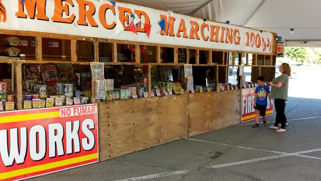 The Merced Marching 100 benefits from fireworks sales from a prime location in the Merced Mall parking lot on Olive Avenue. Photo: Steve Newvine