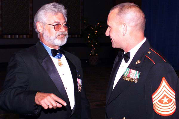 Jon Cavaiani (left) at a ceremonial function. Photo from Military.com)