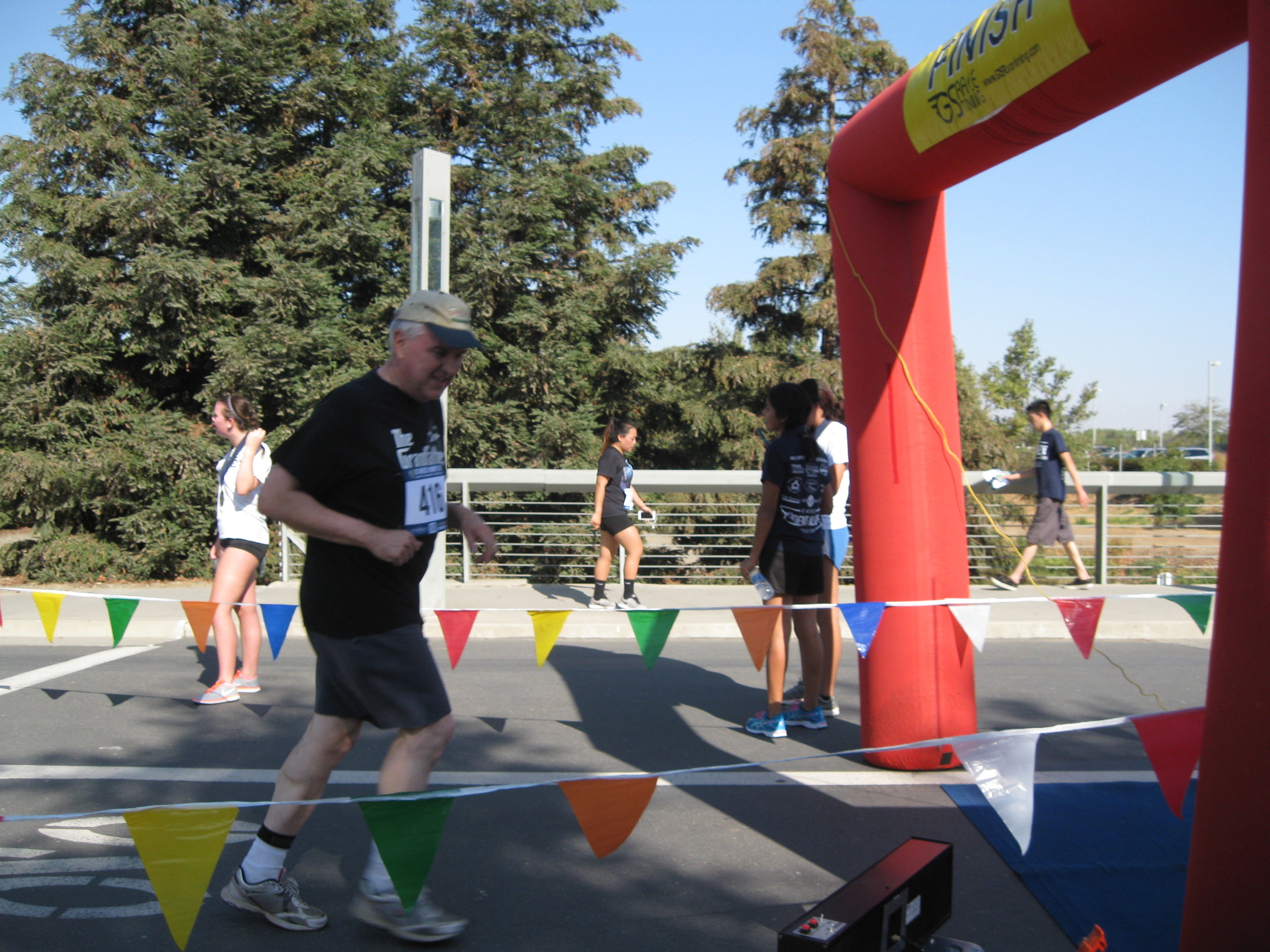 Crossing the finish line at the UC Merced Journey 5-K in September 2016. Photo from the Newvine Personal Collection
