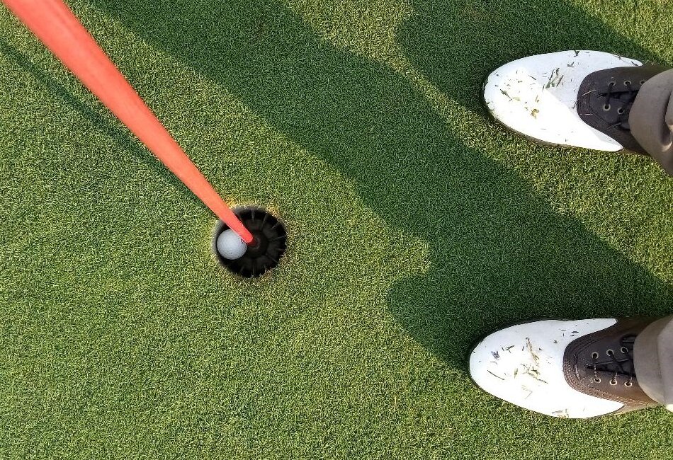 A flag-down view of the hole-in-one ball in the cup. Photo: Newvine Personal Collection